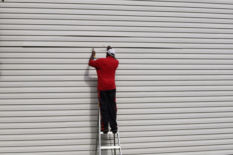 Aligning and Securing Siding Panels